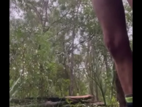 Camping guy pissing with no pants on